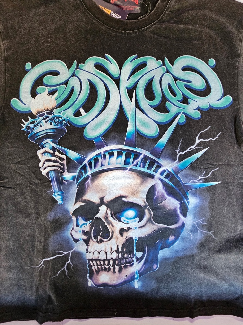 Godspeed Black Graphic Tee with Blue Skull & Statue of Liberty Design